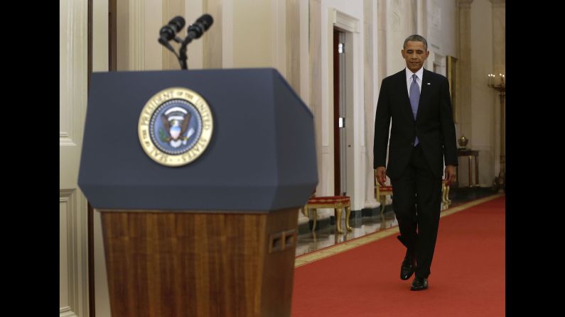 President Barack Obama approaches the podium in the East Room of the White House on Tuesday, September 10, for a speech addressing the nation on the justification for possible military action against the regime of Syrian President Bashar al-Assad. The regime is accused of launching a horrific chemical weapons attack in the suburbs of Damascus that killed more than 1,400 people.