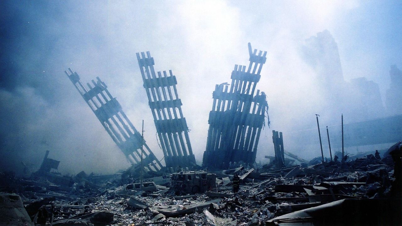 The rubble of the World Trade Center in New York City smolders following the terrorist attack on September 11, 2001.