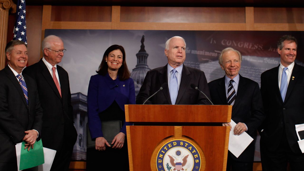 Sens. John McCain R-Arizona, right, Lindsey Graham, R-South Carolina, far left, Saxby Chambliss, R-Georgia, second from left, and Kelly Ayotte, R-New Hampshire, third from left, are all known as ardently pro-military. They are half of an eight-member bipartisan group trying to negotiate a compromise resolution on Syria.