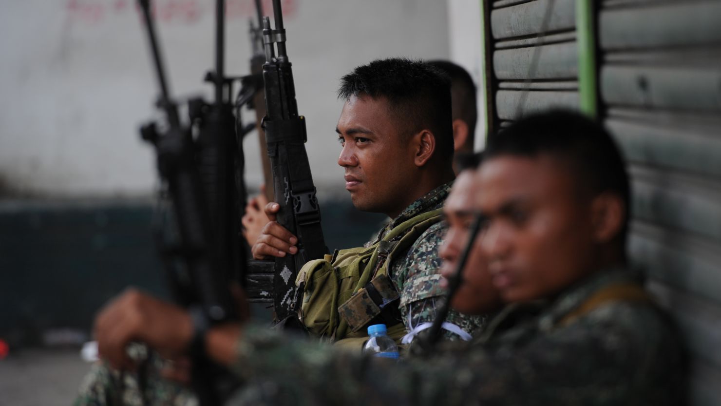 Philippine marines rest amid a lull in clashes with Muslim gunmen on the southern Philippine island of Mindanao on Tuesday.