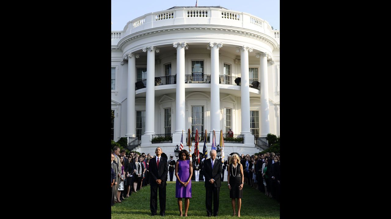 President Barack Obama, first lady Michelle Obama, Vice President Joe Biden and his wife, Jill Biden, observe a moment of silence on the South Lawn of the White House on September 11.