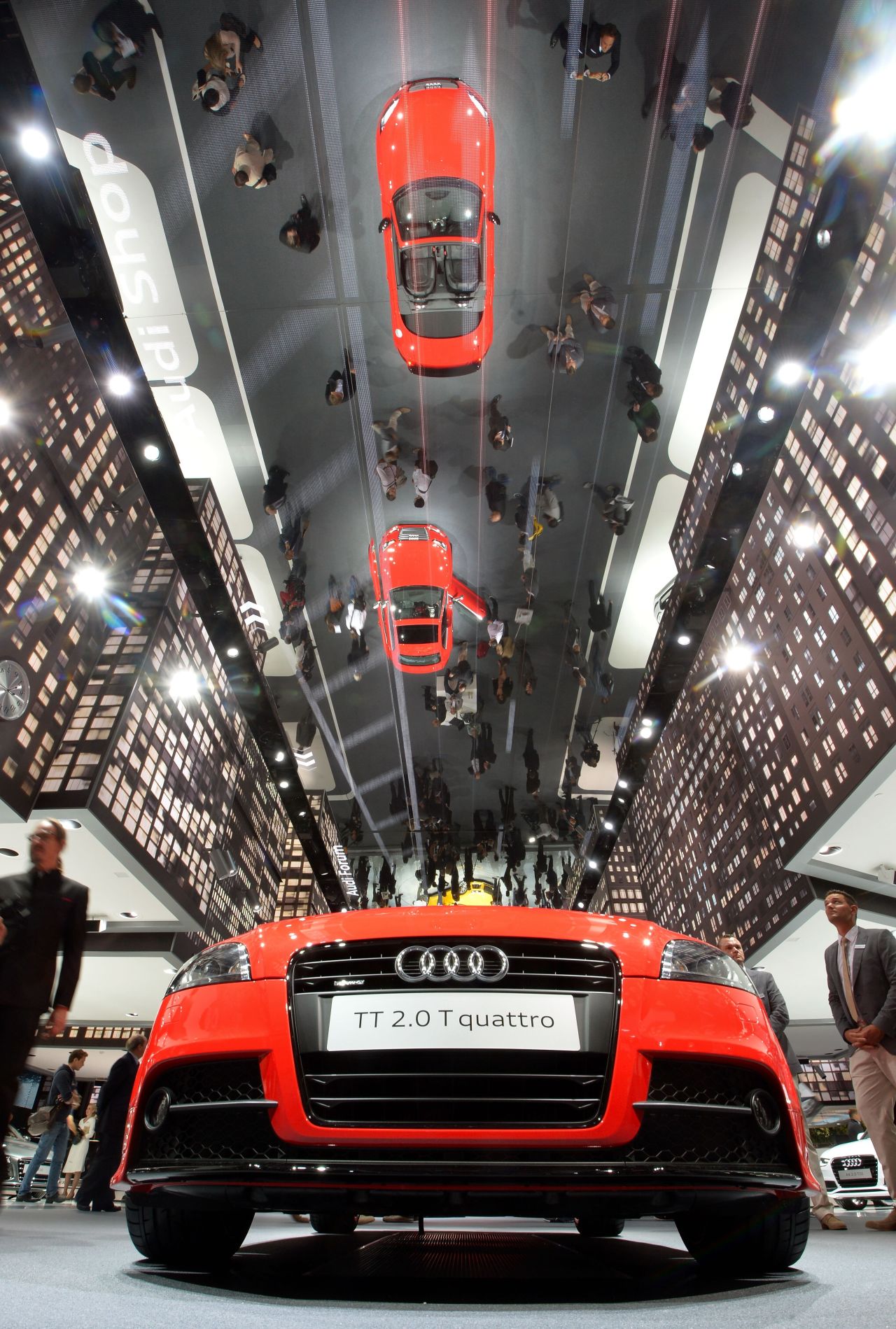 An Audi TTs 2.0 T quattro reflect in the mirror under the ceiling at the IAA international automobile show on September 10, 2013 in Frankfurt, Germany.