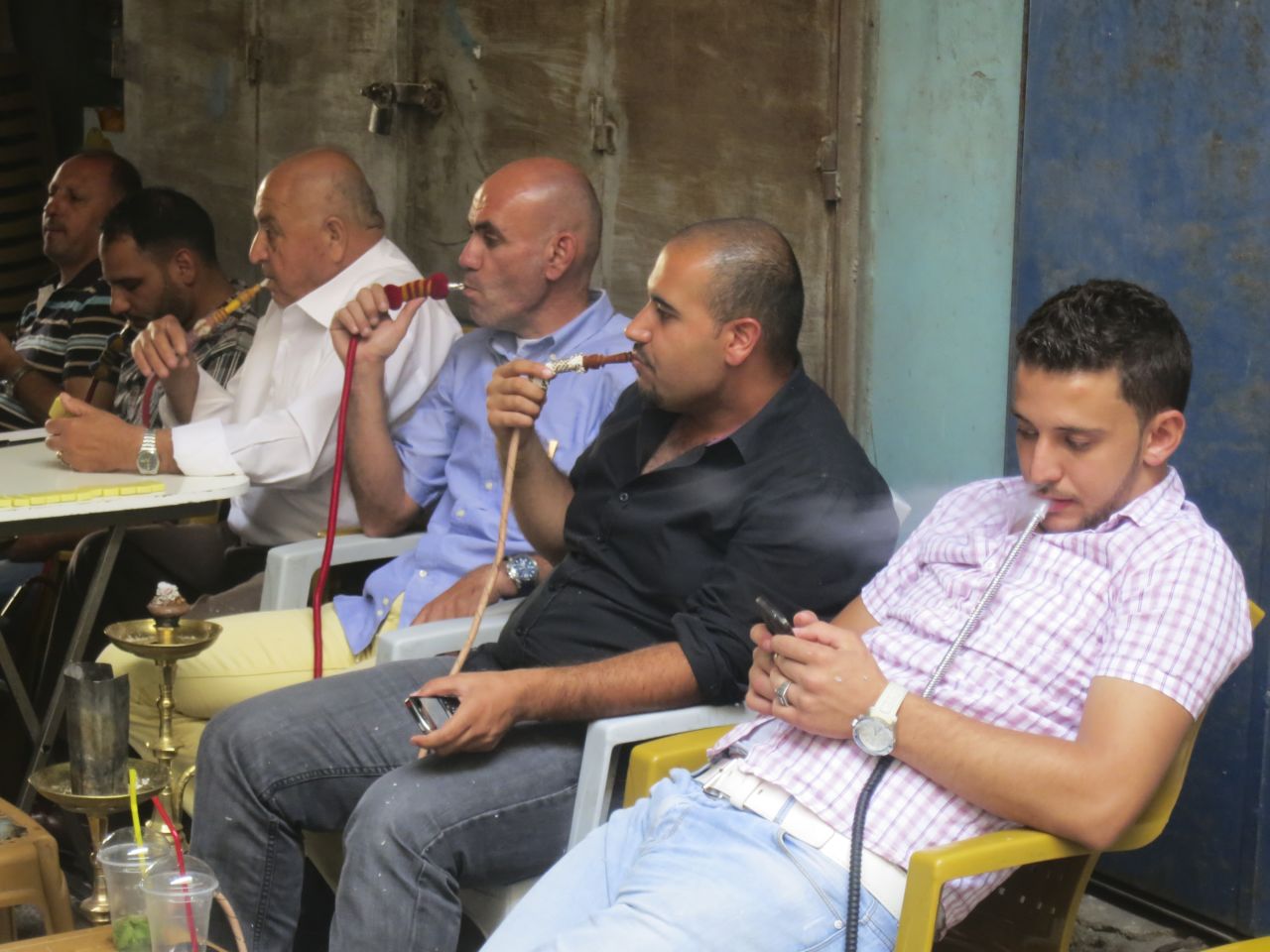 Men at a hookah bar in Jerusalem's Old City.