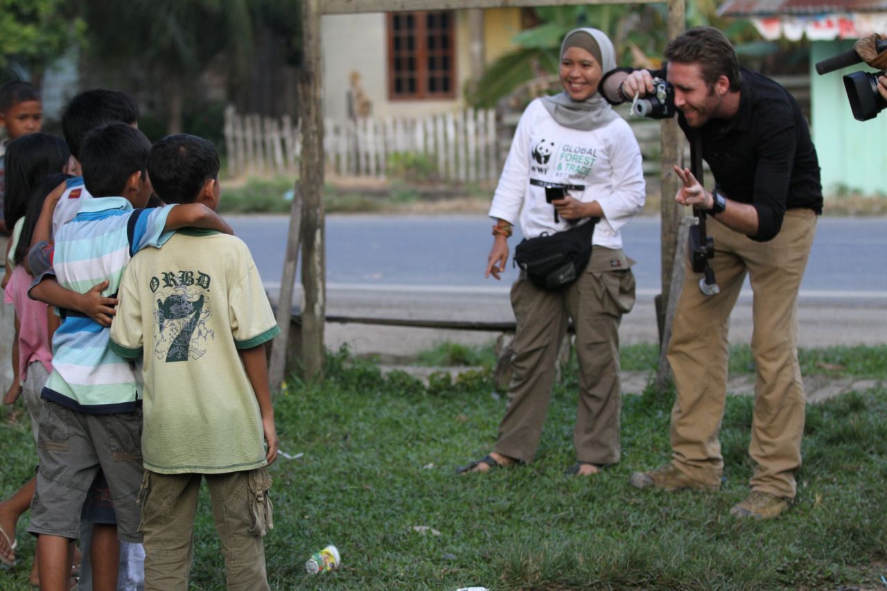 Cousteau captures a slice of local Sumatran life, taking a photo of some of the region's children.