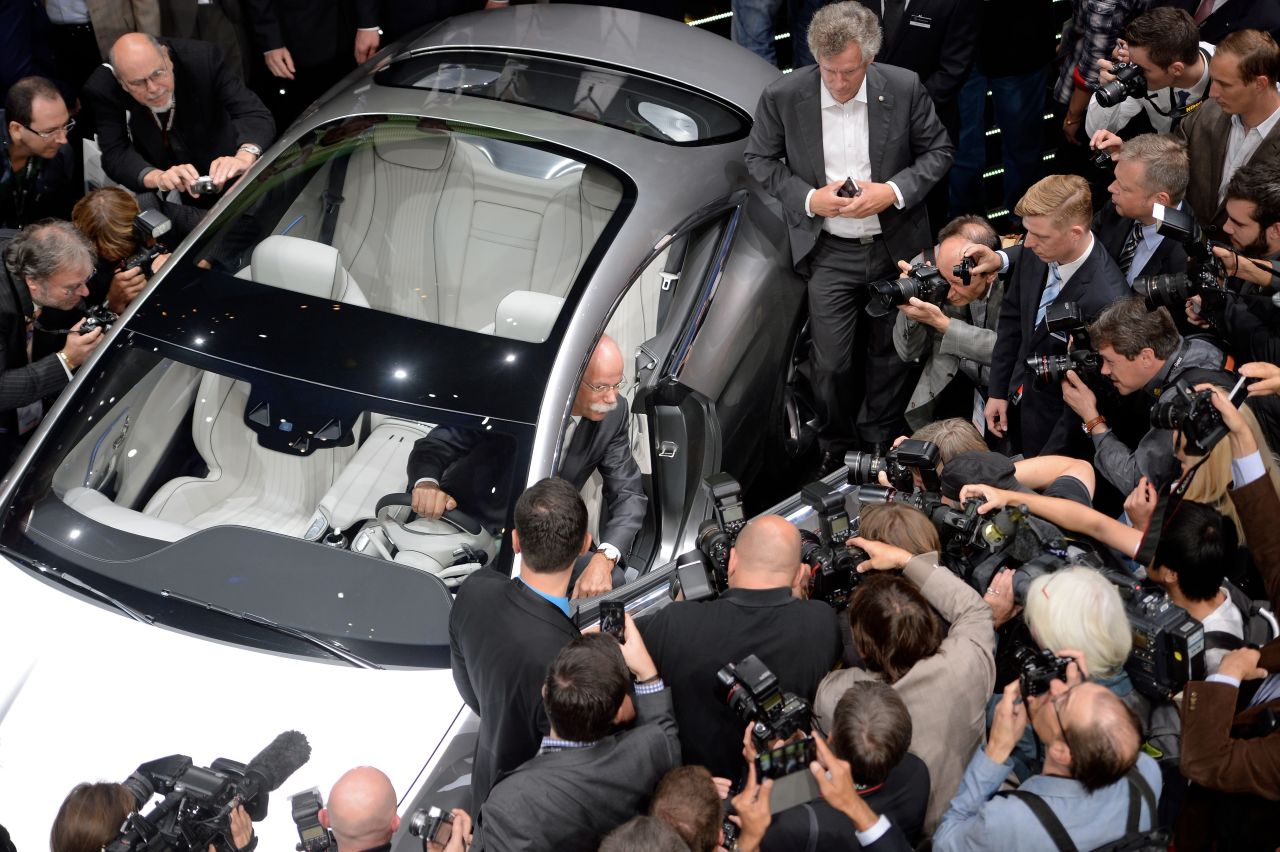Chairman of the board of German car manufacturer Daimler AG, Dieter Zetsche, presents the new Mercedes S-Class Coupe concept car at the IAA international automobile show on September 10, 2013 in Frankfurt, Germany.