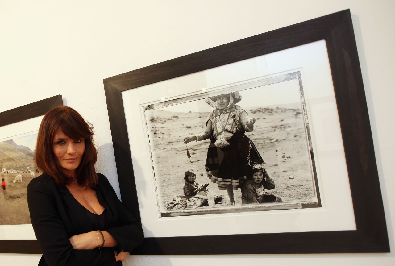 After a career in front of the camera, Danish supermodel Helena Christensen now works behind the lens, pictured here at a 2009 London exhibition of her work. Chirstensen's photographs have appeared in fashion magazines "Marie Claire" and "Elle." The 44-year-old also recently designed a line of bags for Belgium brand Kipling.   