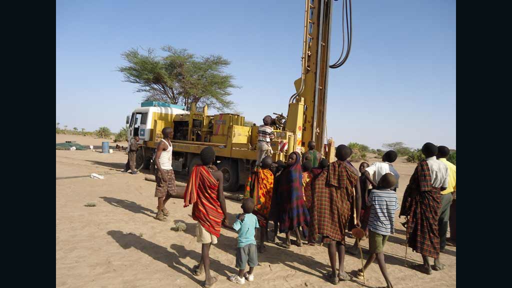 Community members gather at a selected drilling site at Nawaitarong village Kenya in a photo provided by UNESCO.