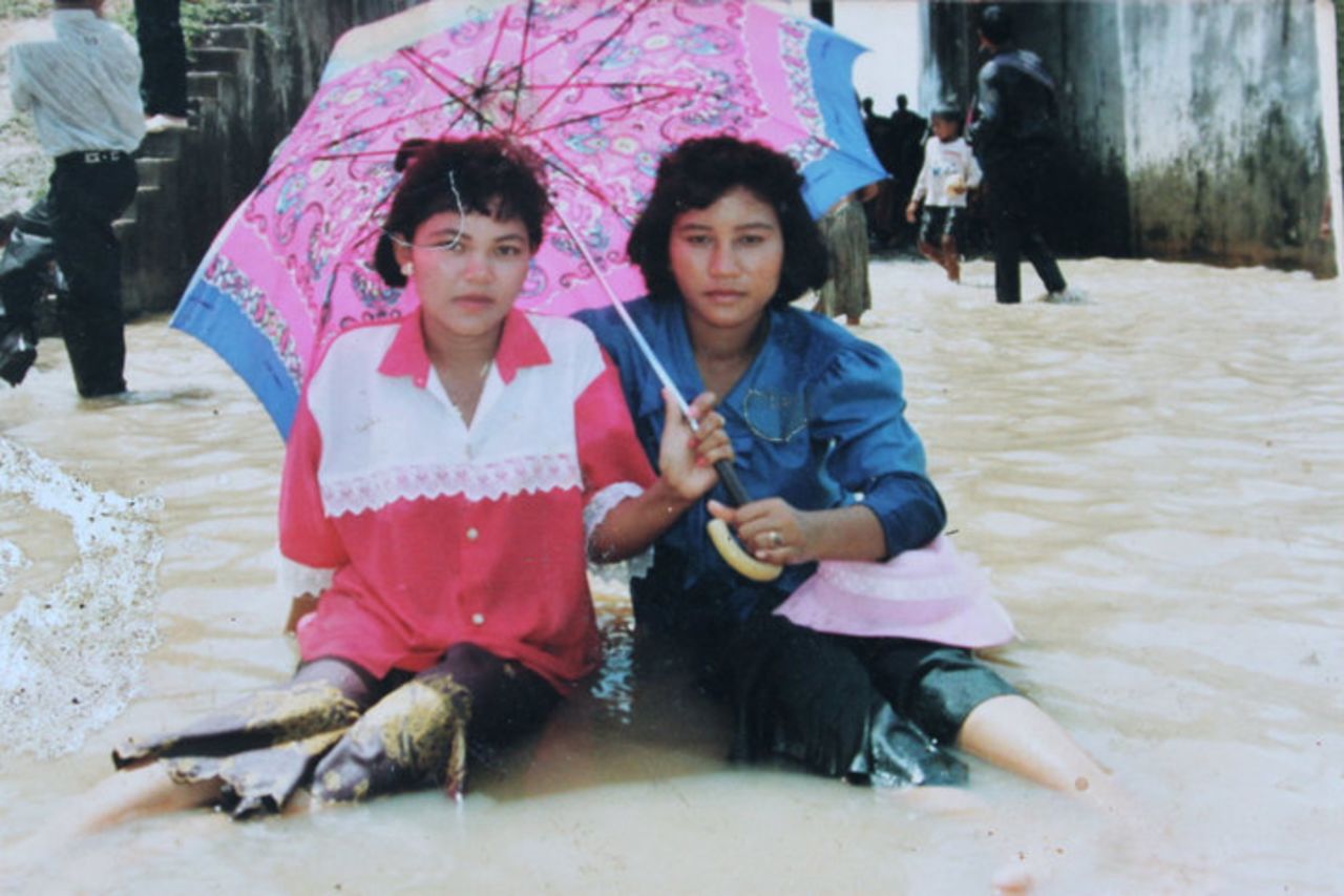 Powers: "One of only two surviving photos of my birth mother, on the right."
