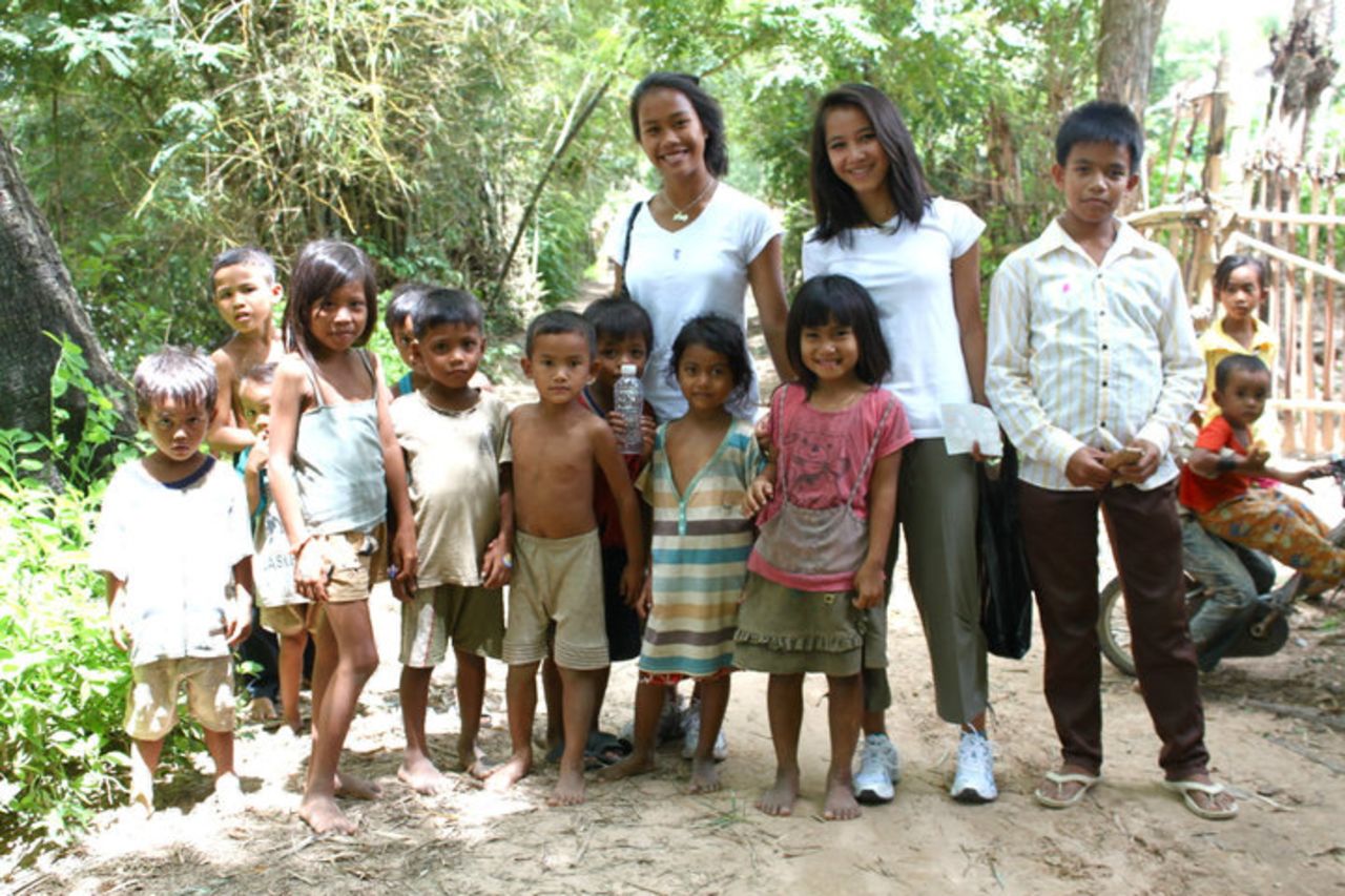 Srey Powers was adopted from Cambodia when she was six years old. Here she meets children in the northern village where her birth sister lives. 