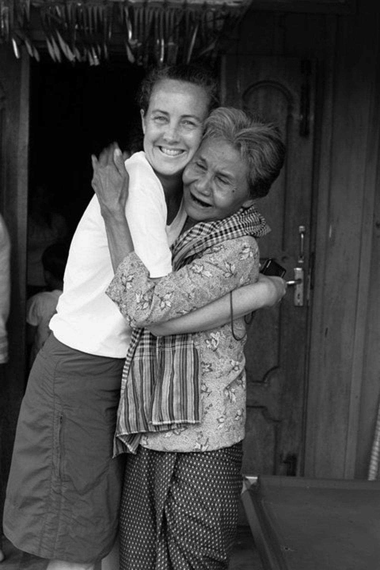Powers' U.S. mother, Claudia. "Watching my mother's attempt to put my (grandmother) at ease, I was struck by how different my life would have been if she had not adopted me."
