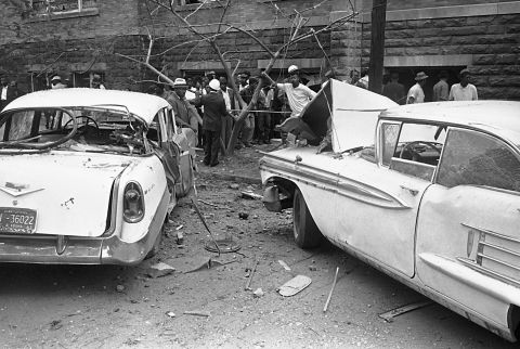 Cars parked beside the church were damaged by the blast.