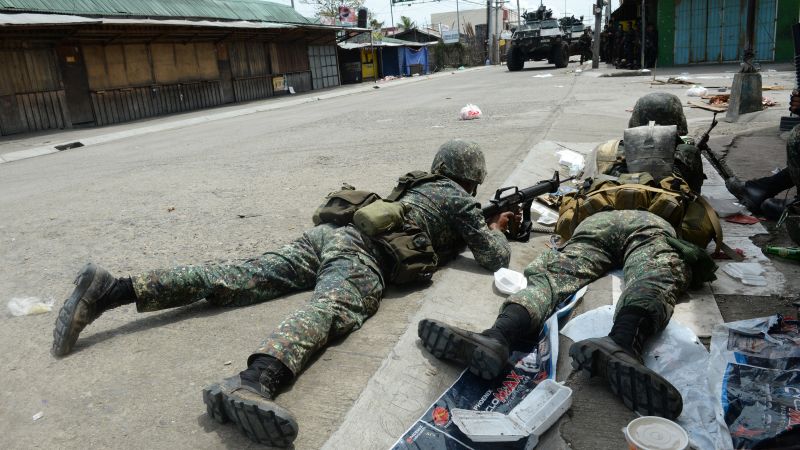 Philippines troops contain rebels as Zamboanga siege drags on | CNN