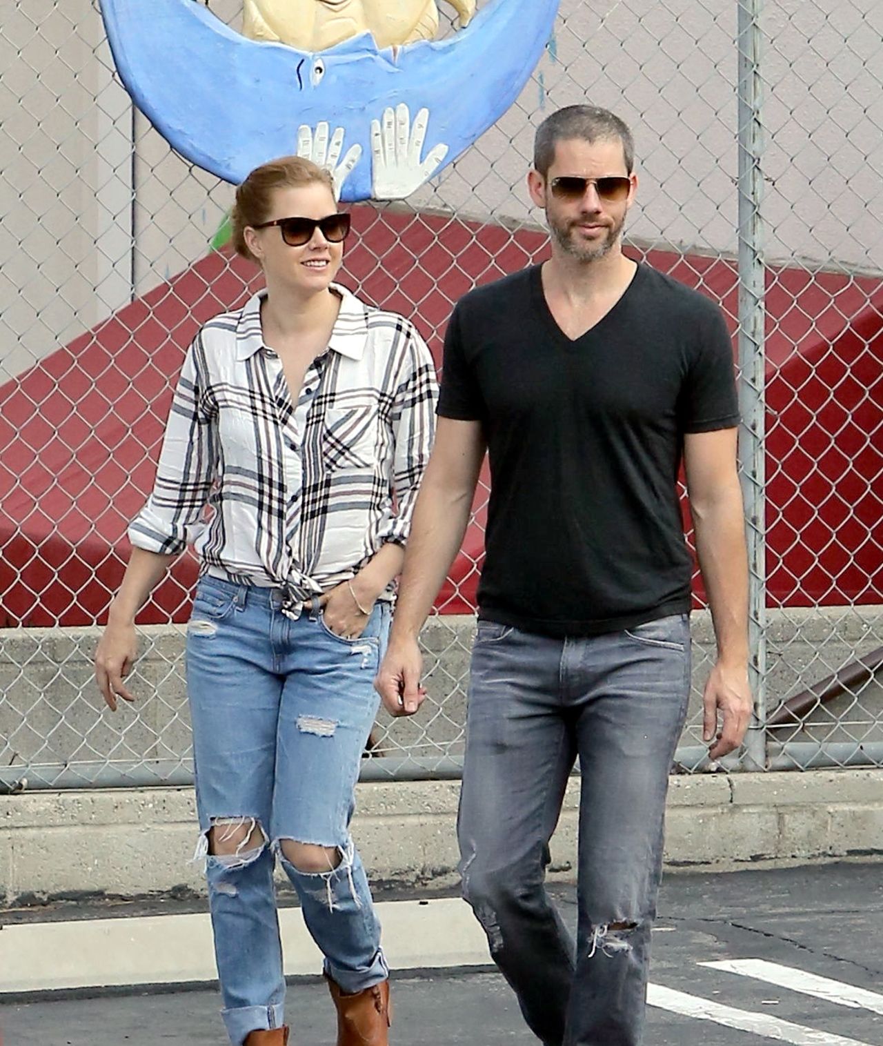 "American Hustle" star Amy Adams and partner Darren Le Gallo take a laidback walk on September 11.