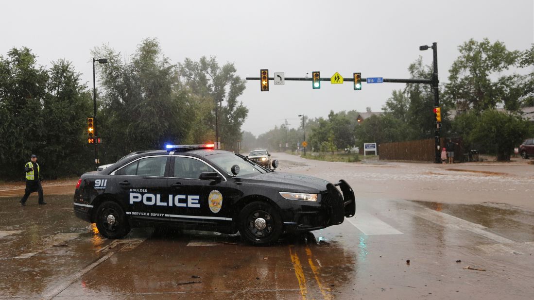 A police officer blocks off a road in Boulder on September 12.