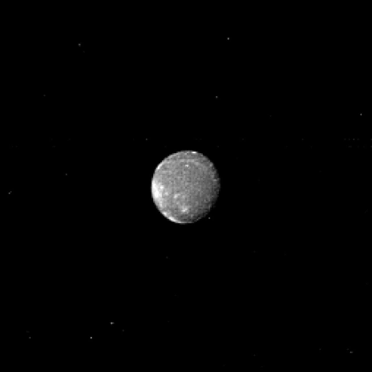 Distinct bright patches are visible on Ariel, the brightest of Uranus' five largest satellites.