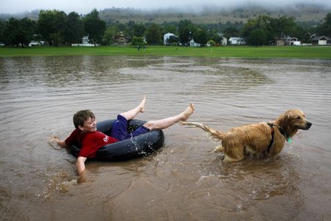 Nicky Toor, 15, floats on the flooded lawn of North Boulder Park in Boulder on September 12.