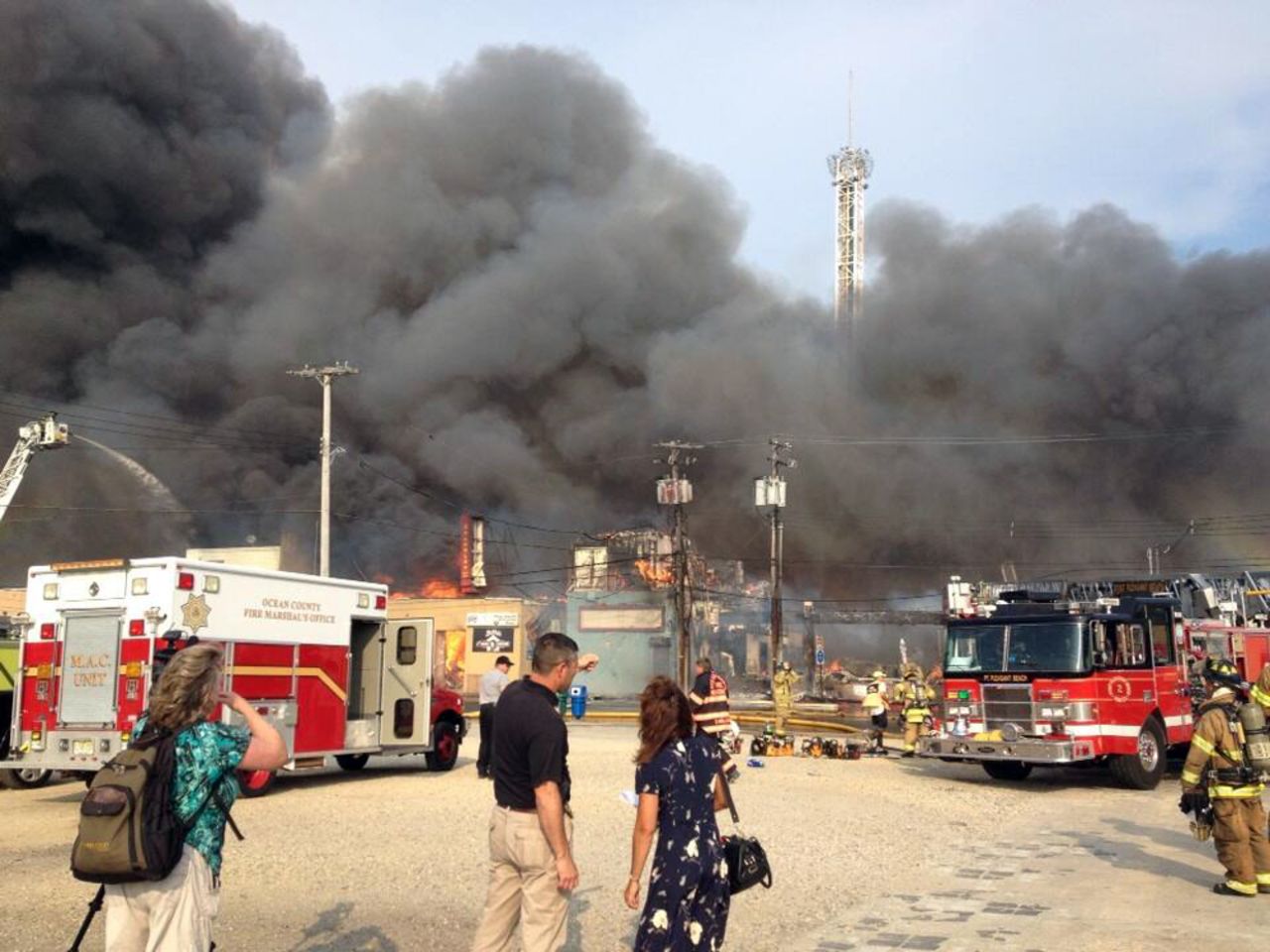 Firefighters work to bring the blaze under control.
