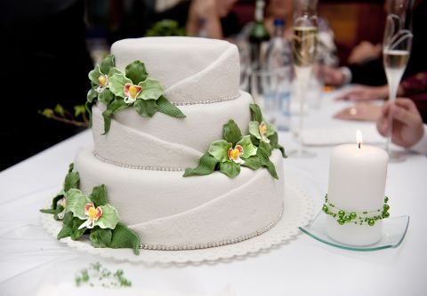 Wedding cake makes a great photo op, but many guests just take a bite or two, if any. Consider a small "show cake" and a less-expensive dessert bar.