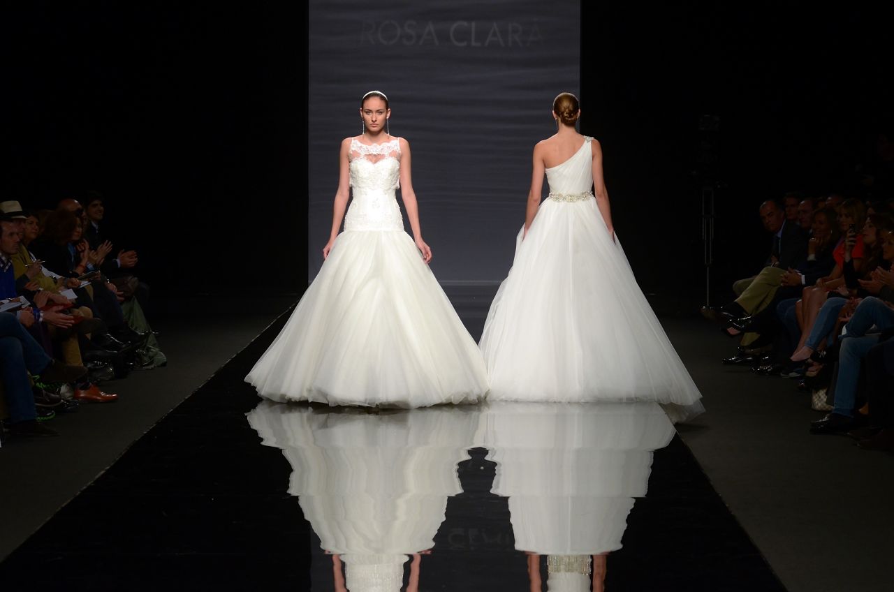 A bride may have dreamed of a frothy, fancy designer dress since childhood, but many come to regret the expense and the discomfort of wearing it all night. Plenty of brides say they're just as happy having an off-the-rack or sample dress altered so it fits perfectly.