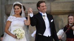 The newly wed Princess Madeleine of Sweden and Christopher O'Neill hold hands outside the chapel on Saturday, June 8, 2013 at the royal palace in Stockholm after the Swedish Royal wedding ceremony.