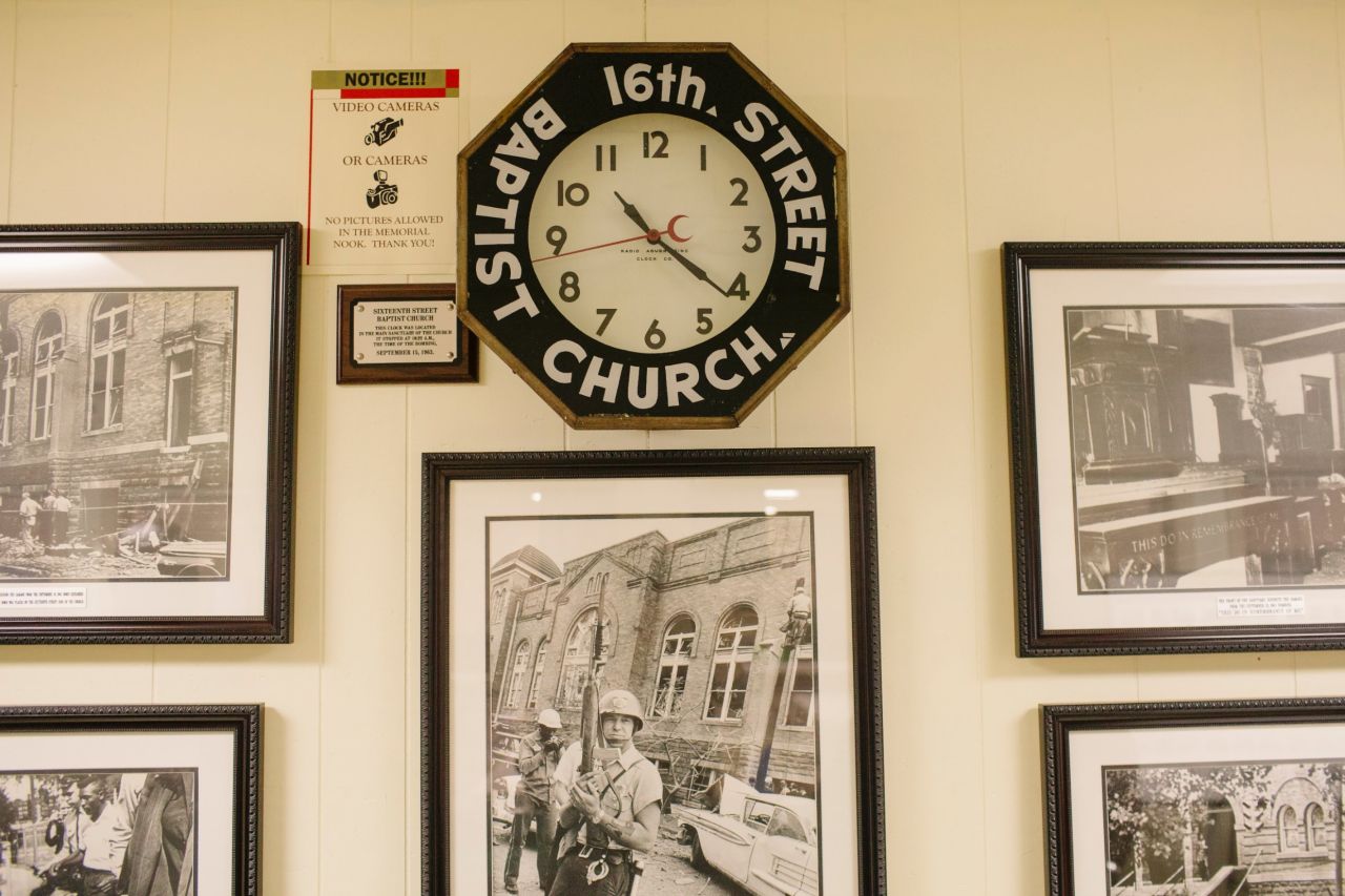 The clock that once hung in the church's sanctuary stopped at 10:22 a.m. when the bomb planted by Ku Klux Klansmen exploded 50 years ago. It is on display in the church basement, along with photographs illustrating the tensions of the era.