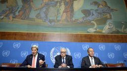US Secretary of State John Kerry (L) speaks on September 13, 2013 next to United Nations-Arab League special envoy for Syria Lakhdar Brahimi (C) and Russian Foreign minister Sergey Lavrov during a press conference after their high-stakes talks on Syria's chemical weapons at the UN headquarters in Geneva. Kerry said on September 13 he would meet again with his Russian counterpart Sergei Lavrov in New York later this month to try to set a date for a long-delayed peace conference for Syria.                AFP PHOTO/PHILIPPE DESMAZES        (Photo credit should read PHILIPPE DESMAZES/AFP/Getty Images)
