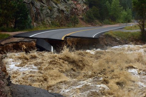 Highway 7 is completely blown out from the South St. Vrain River as a torrent of raging water rips through it about 12 miles west of Lyons on Thursday, September 12.
