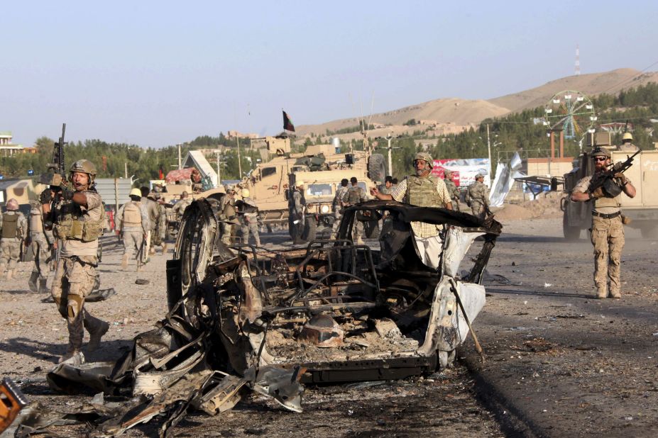 U.S. troops led the investigation of the site of a suicide car bombing and a gunfight near the <a href="http://www.cnn.com/2013/09/13/world/asia/us-consulate-afghanistan-attack/index.html?hpt=hp_t2">U.S. consulate in Herat, Afghanistan</a>, on Friday, September 13. Taliban militants attacked the consulate using a car bomb and guns to battle security forces just outside the compound. An intercepted al Qaeda message led to the <a href="http://www.cnn.com/2013/08/04/politics/us-embassies-close/index.html">closing of 22 embassies and consulates</a> across the Middle East and North Africa on August 4. Take a look at other attacks on U.S. diplomatic sites in recent years.