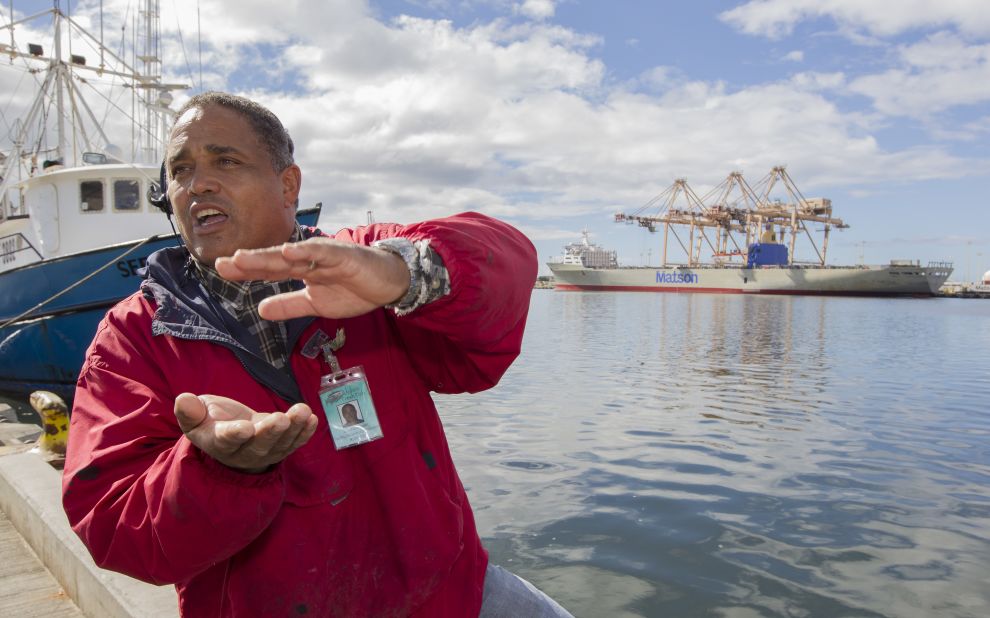 John Hernandez of Kailua, Hawaii, describes the effect that the molasses spill will have on marine life in Honolulu Harbor and nearby Keehi Lagoon on September 12. A leak in a pipeline to a Matson Navigation ship spewed as many as 1,400 tons -- 233,000 gallons -- of the sticky stuff into the water
