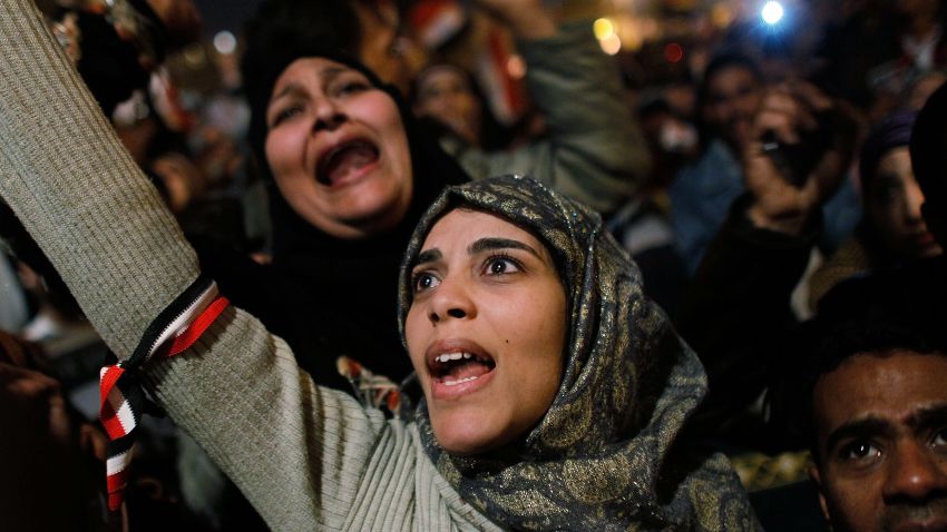 CAIRO, EGYPT - FEBRUARY 11: A woman cheers in Tahrir Square after it is announced that Egyptian President Hosni Mubarak was giving up power February 11, 2011 in Cairo, Egypt. After 18 days of widespread protests, Egyptian President Hosni Mubarak, who has now left Cairo for his home in the Egyptian resort town of Sharm el-Sheik, announced that he would step down. 