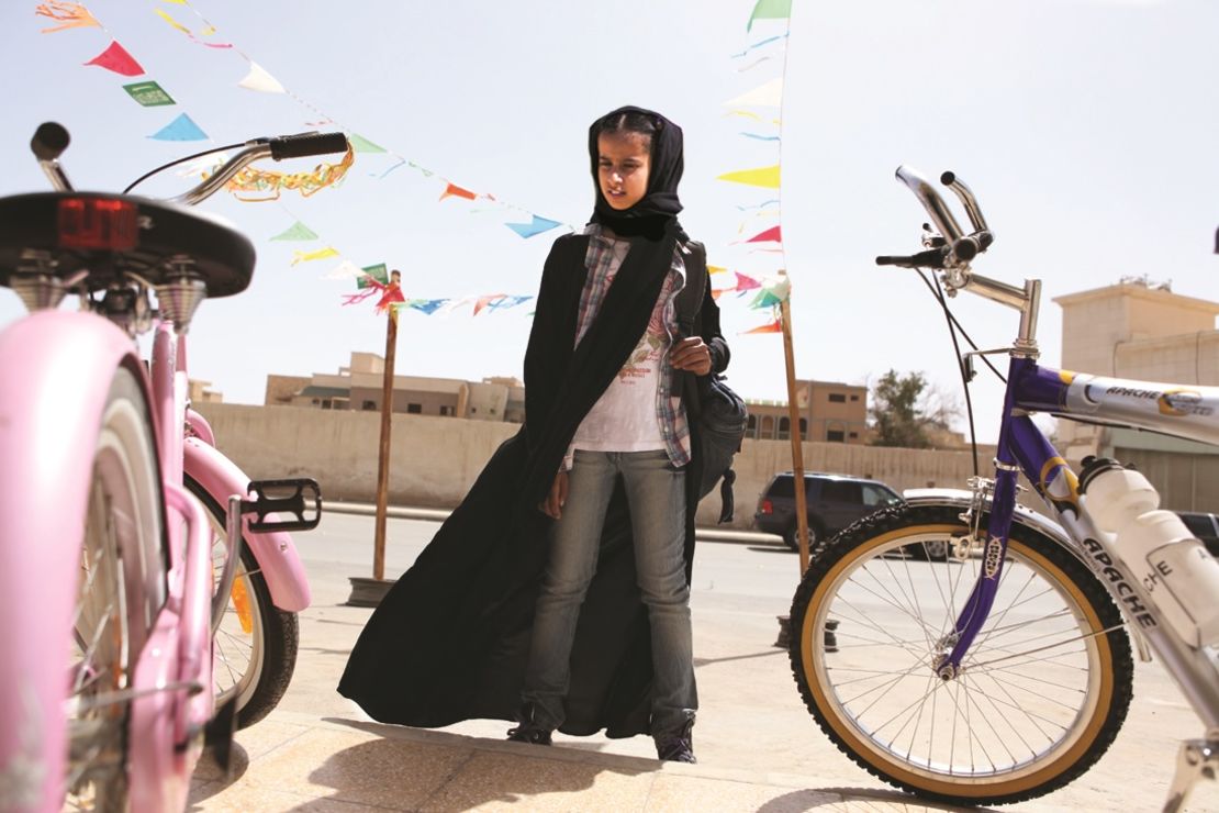 A still from the film "Wadjda", about an 11-year-old girl who dreams of owning a green bicycle.