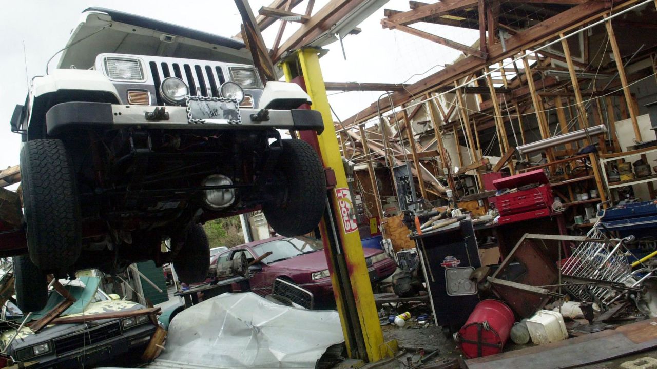 Just three weeks after Frances, on September 26, 2004, Hurricane Jeanne's 60-mile-wide eye crossed the Florida coast near Stuart, at virtually the same place Frances made landfall. Maximum winds were estimated at 120 mph. The storm tore apart this auto shop in Sebastian, Florida. Jeanne was blamed for three deaths in Florida, and one each in Puerto Rico, South Carolina and Virginia.