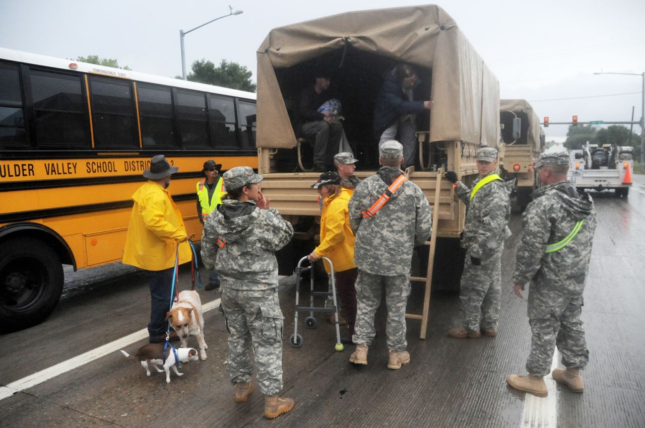 The guardsmen are using Light Medium Tactical Vehicles, or LMTVs, which can transport about 16 people with luggage, to assist the evacuation. The LMTVs can navigate through rubble and flooded areas that otherwise could not be reached by rescue personnel.