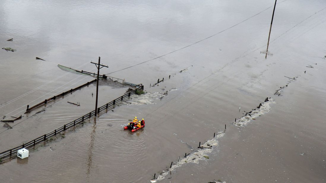 Rescue personnel search for flood victims near Fort Collins, Colorado, on September 13.