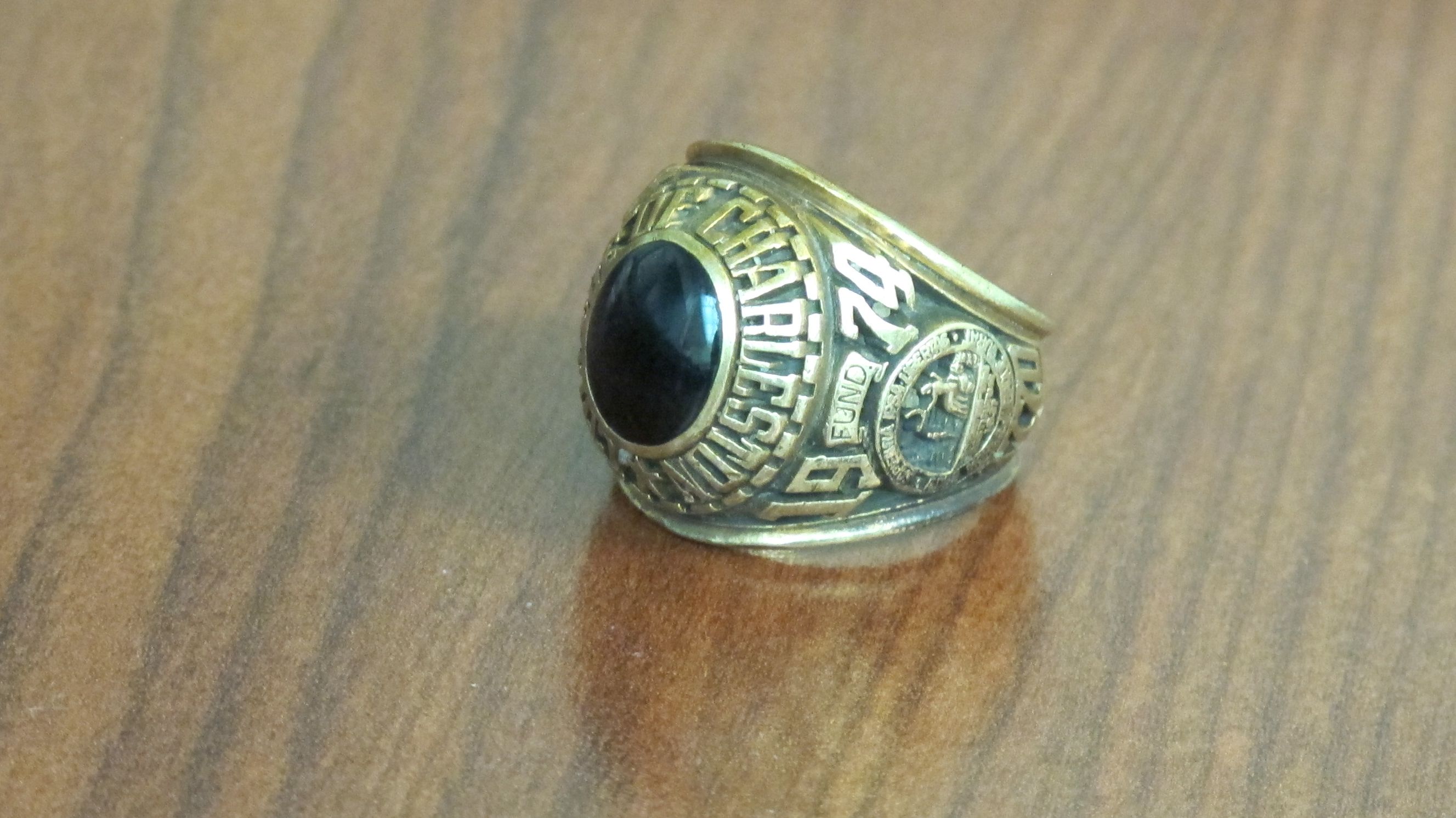 The large, gold ring had the initial RLP inscribed inside it.