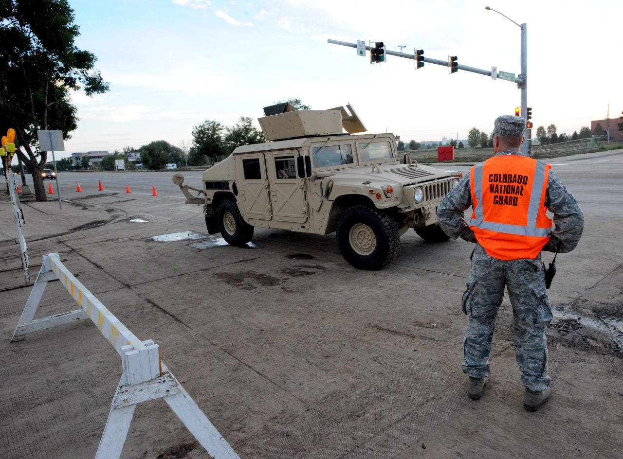 A National Guardsman stands at South Main and Missouri streets in Longmont, Colorado, on September 14. 
