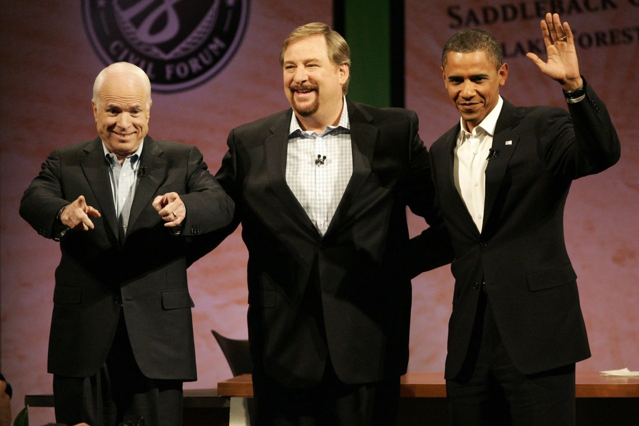 Presidential candidates Sens. John McCain and Barack Obama join Warren onstage at the Saddleback Civil Forum on the Presidency at Saddleback Church on August 16, 2008.