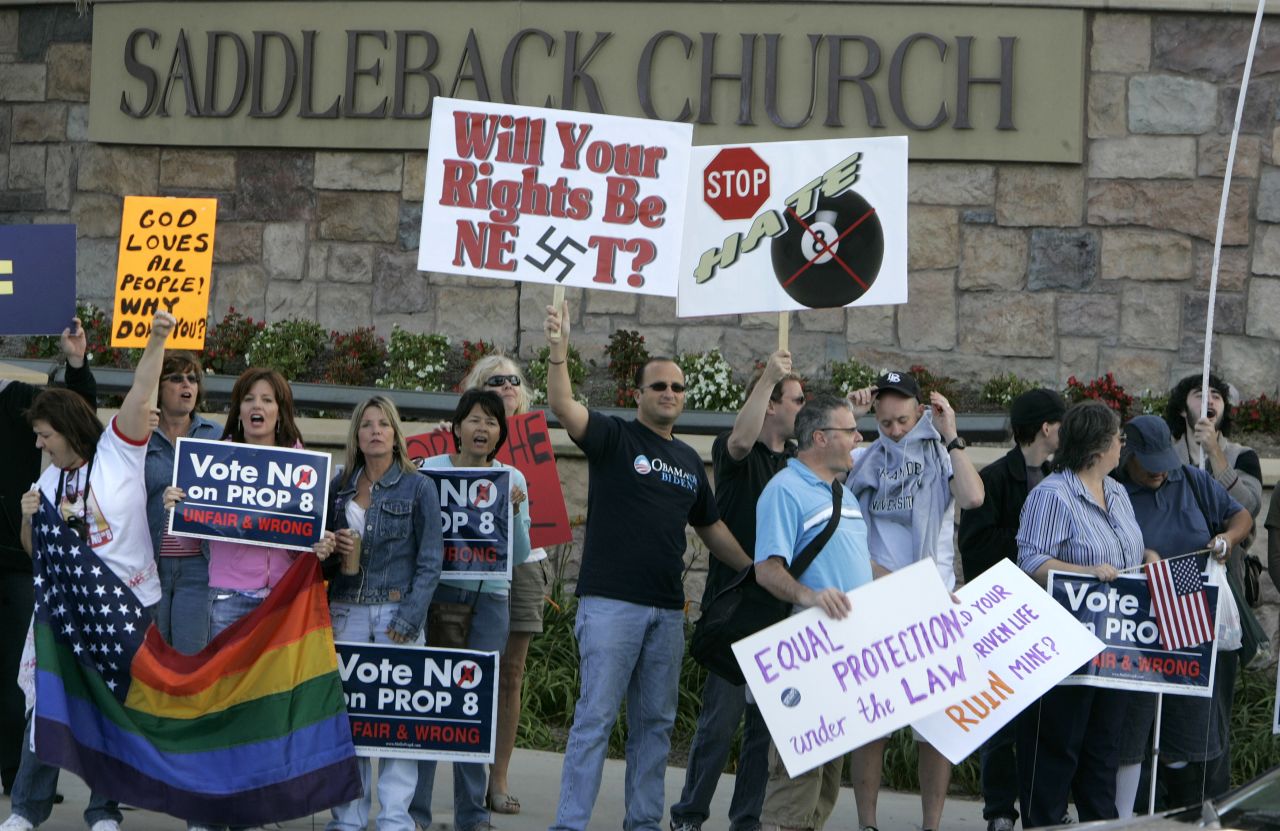 Hundreds of protesters gather outside Warren's Saddleback Church on October 19, 2008, after Warren came out in support of California's Proposition 8, denying same-sex couples the right to marry. 