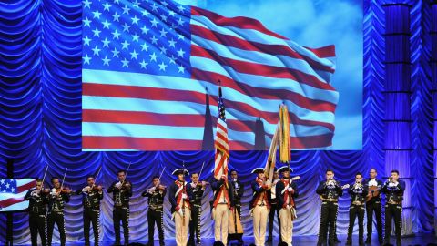 A color guard and a mariachi band share the stage at the 26th Annual Hispanic Heritage Awards in Washington on September 5.