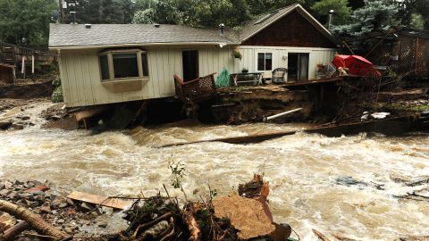 Floodwaters surround a home in Jamestown, Colorado, on Sunday, September 15.