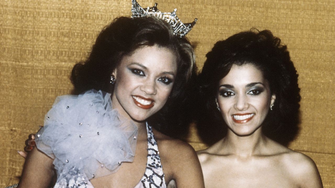 Vanessa Williams, left, is shown after being crowned Miss America 1984 in Atlantic City.  Williams resigned after nude photographs of her were revealed to the public, and Suzette Charles, right, who had been the first runner-up, took the title of Miss America 1984. 