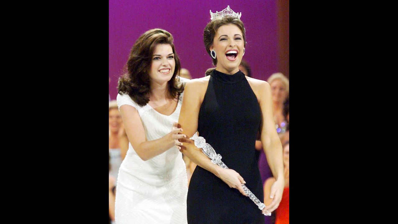 Miss America 1997 Kate Shindle crowns Miss Virginia Nicole Johnson as her successor in the Miss America 1998 competition.