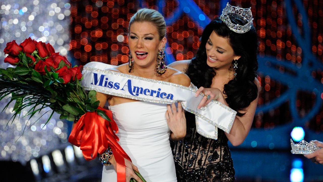 Miss America 2012 Laura Kaeppeler, right, wraps  the sash around Mallory Hytes Hagan of New York, the new Miss America during the 2013 Miss America Pageant at PH Live at Planet Hollywood Resort & Casino on January 12, 2013 in Las Vegas.
