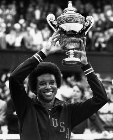 Arthur Ashe is all smiles as he holds the Wimbledon trophy aloft after his upset win over hot favorite Jimmy Connors in the 1975 final. But Ashe's tennis achievements are just part of his remarkable legacy.