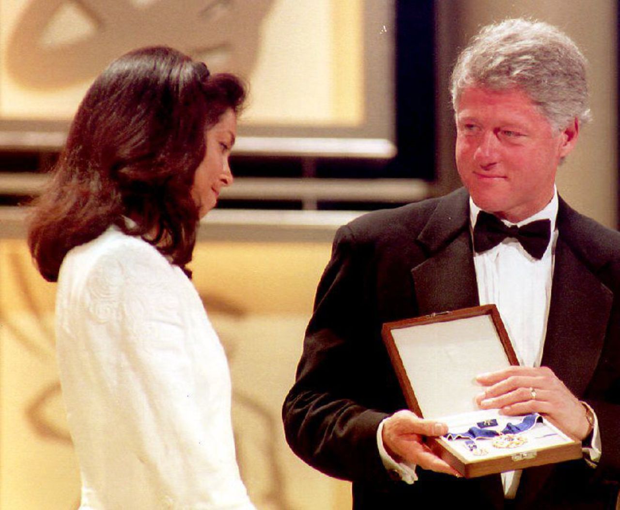 Ashe's widow Jeanne receives the Presidential Medal of Freedom from Bill Clinton on behalf of her late husband in June 1993. 
