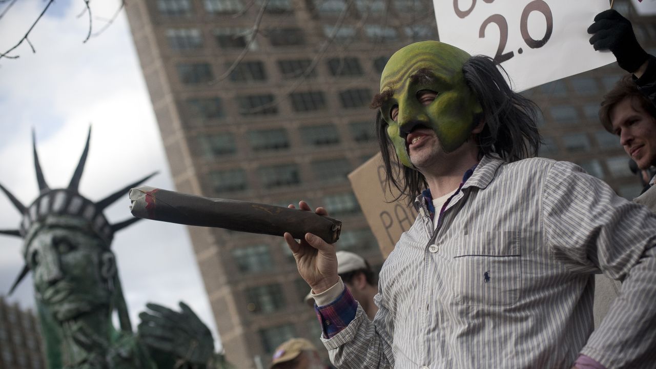 An Occupy Wall Street protester in 2011 stages a play as New York Mayor Michael Bloomberg.