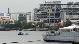 Police boats patrol the water outside  the Navy Yard complex where a shooting took place in Washington D.C., on September 16.