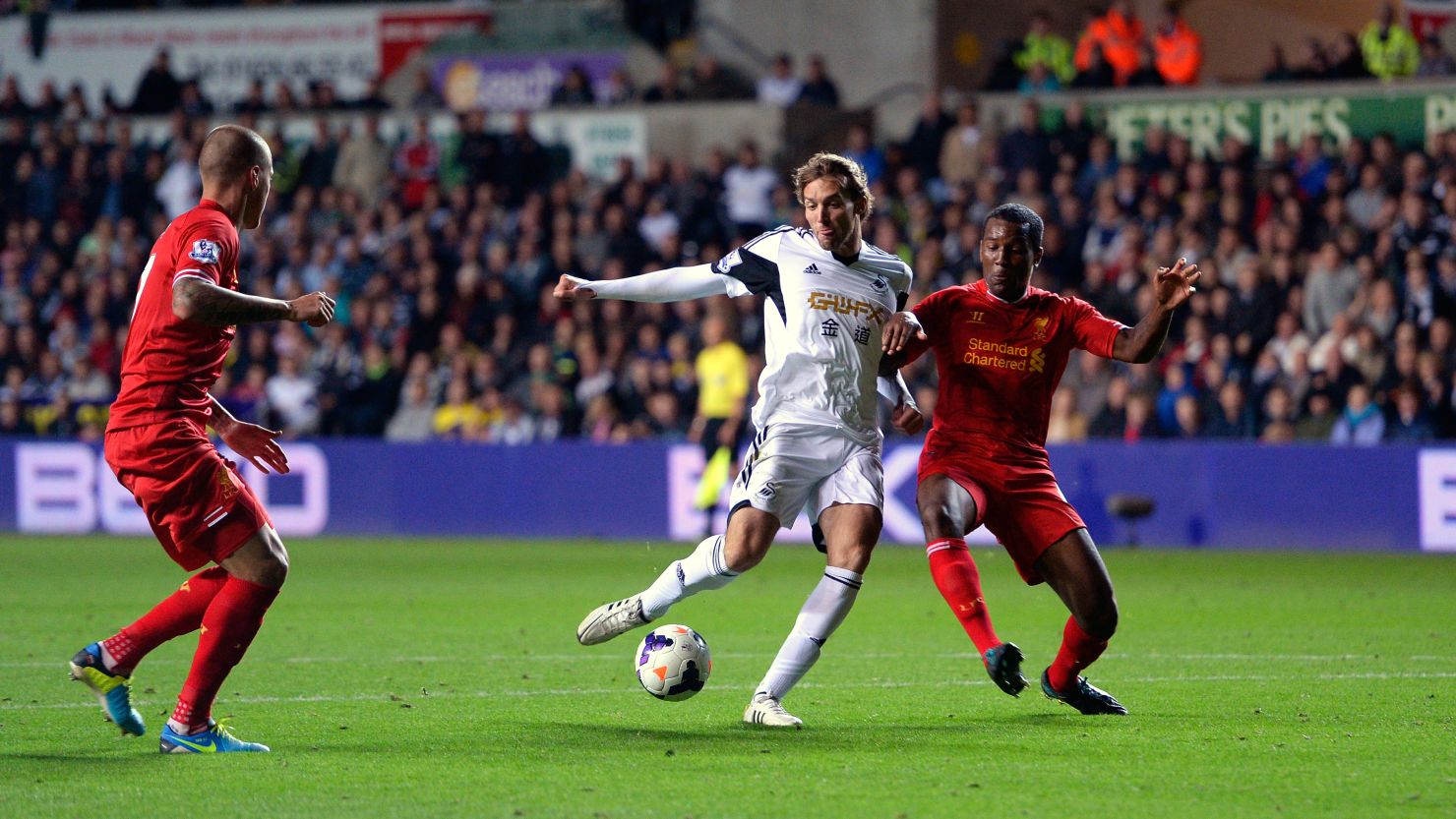 Swansea's Spanish striker Michu struck a second half equalizer to deny Liverpool victory.