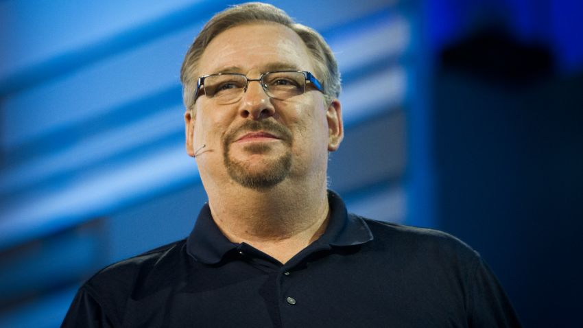 Pastor Rick Warren gives a sermon recently, at Saddleback Church, in Lakewood, California. Pastor Warren is slowly returning to the spotlight, five months after his youngest son committed suicide.