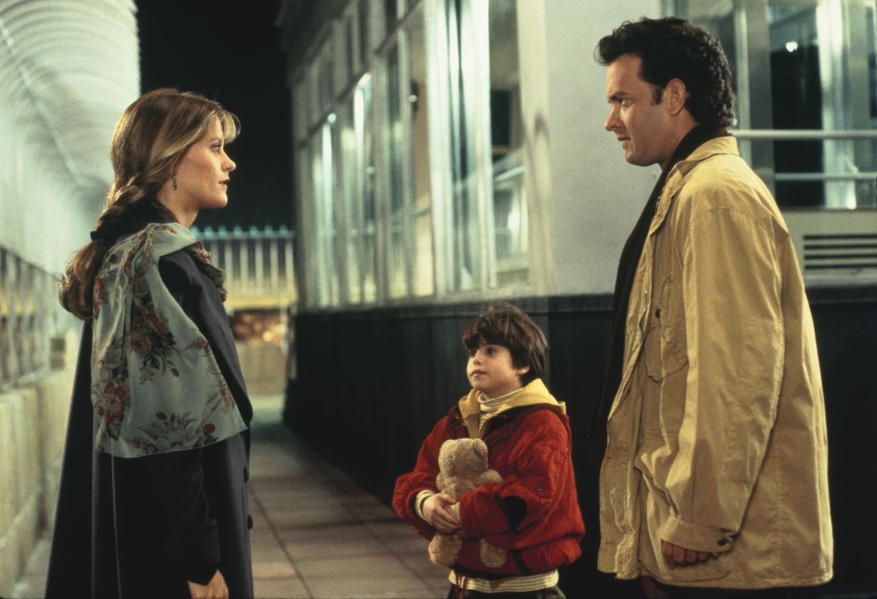 The 1993 film "Sleepless in Seattle" brought together Annie Reed, a Baltimore journalist played by Meg Ryan, and Sam Baldwin, a single dad from Seattle played by Tom Hanks. Their relationships played out through radio, letters, airport sightings and a date secretly set up by young Jonah Baldwin, played by Ross Malinger.